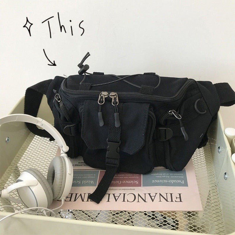 CAnguro riñonera negra cierres en cremallera ajustable