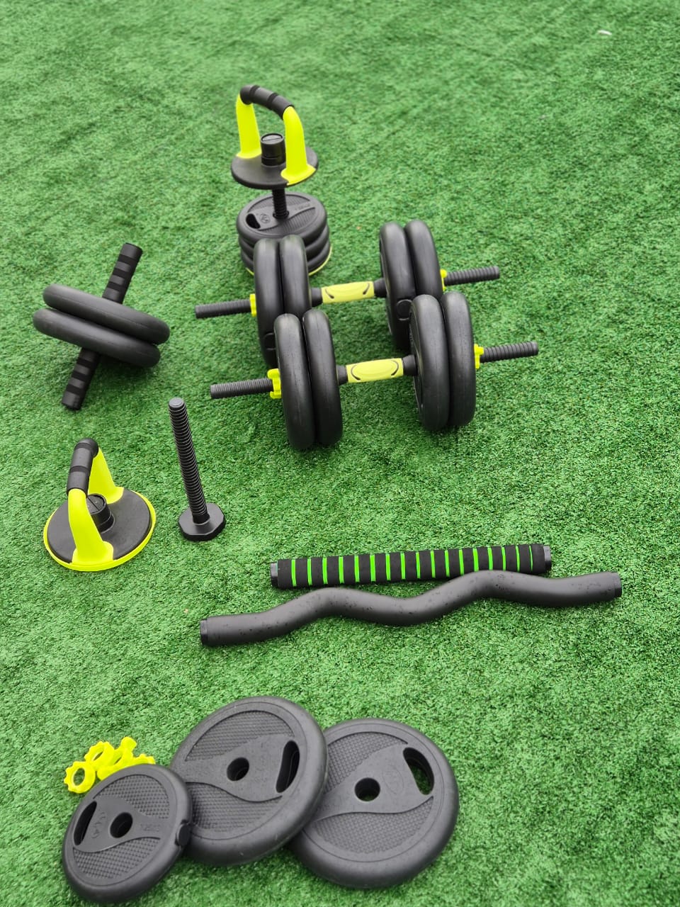 Kit de pesas ajustables 40kg con mancuernas, barra larga, barra curva, pesa rusa y accesorios para entrenamiento completo en casa.